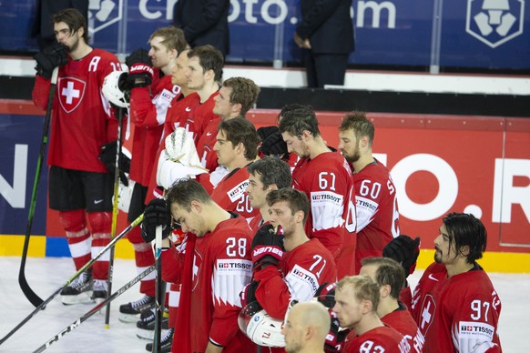 Switzerland&#039;s players look disappointed after losing against the Germany team, during the IIHF 2021 World Championship quarter final game between Switzerland and Germany, at the Olympic Sports Ce ...