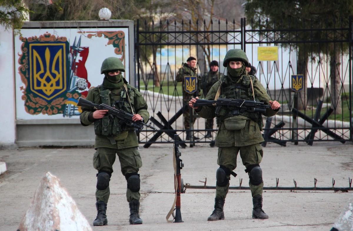 Perevalnoe / Crimea - 03.19.2014: Ukrainian soldiers guard the entrance to the territory of the military base.
