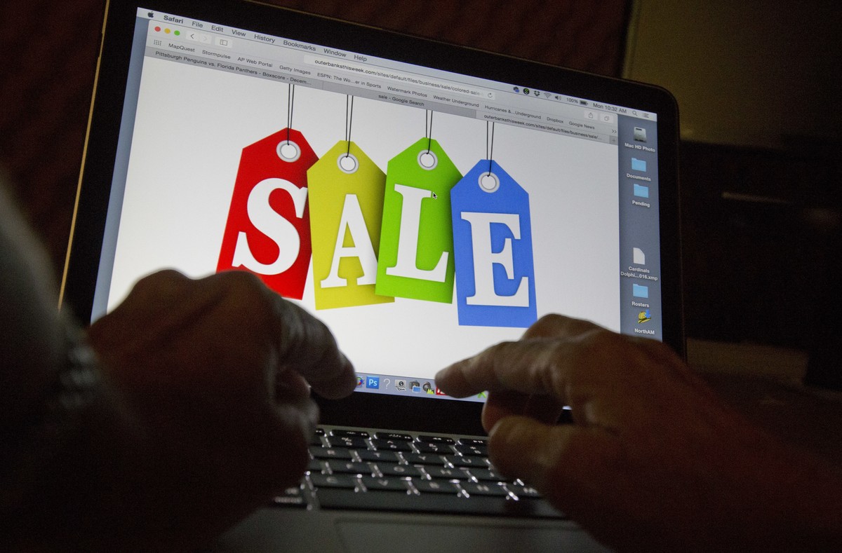 In this Dec. 12, 2016, photo, a person searches the internet for sales, in Miami. Days after flocking to stores on Black Friday, consumers are turning online for Cyber Monday to score more discounts o ...