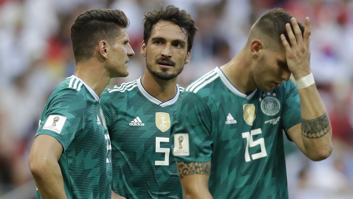 Germany's Mario Gomez, Mats Hummels and Niklas Suele, from left, react after Germany was eliminated during the group F match between South Korea and Germany, at the 2018 soccer World Cup in the K ...