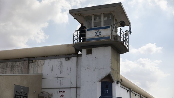 A prison guard stands at the Gilboa prison in northern Israel, Monday, Sept. 6, 2021. Israeli forces on Monday launched a massive manhunt in northern Israel and the occupied West Bank after several Pa ...