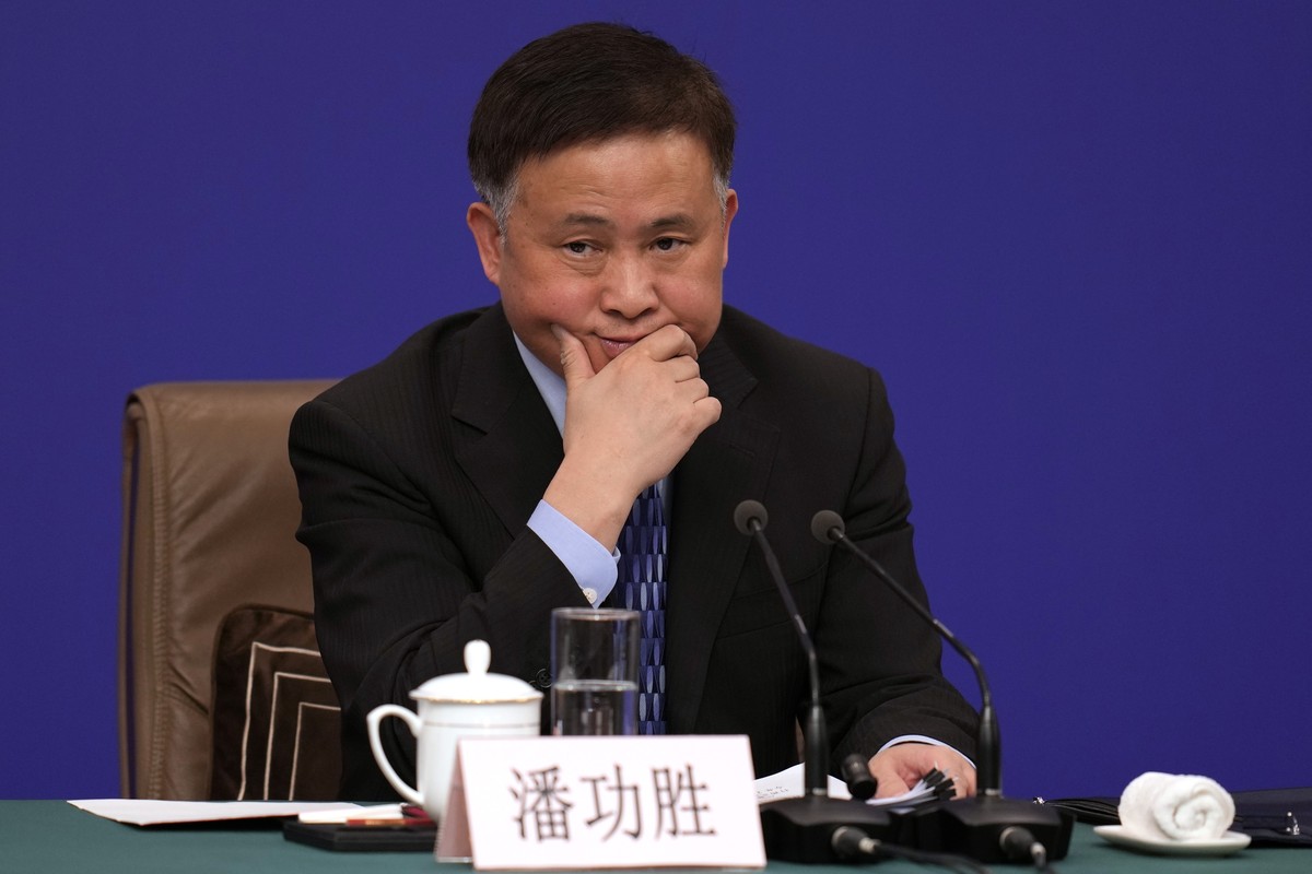 Governor of the People's Bank of China Pan Gongsheng speaks at a press conference on the sideline of the National People's Congress in Beijing, Wednesday, March 6, 2024. (AP Photo/Ng Han Gua ...