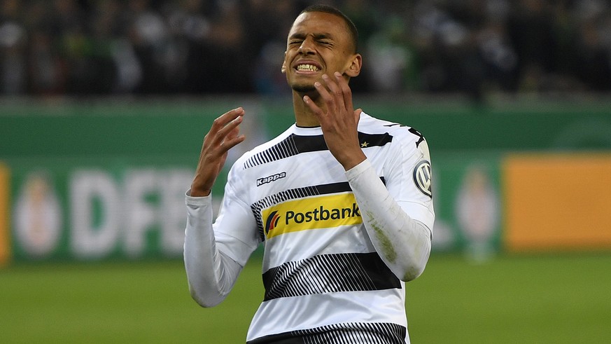 Moenchengladbach&#039;s Djibril Sow reacts after he missed to score his penalty during the German Soccer Cup semifinal match between Borussia Moenchengladbach and Eintracht Frankfurt in Moenchengladba ...
