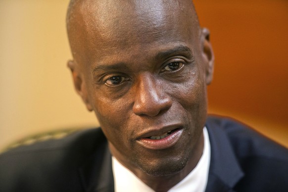 FILE - Haiti&#039;s President Jovenel Moise speaks during an interview at his home in Petion-Ville, a suburb of Port-au-Prince, Haiti, Feb. 7, 2020. A former Haitian senator pleaded guilty on Tuesday, ...