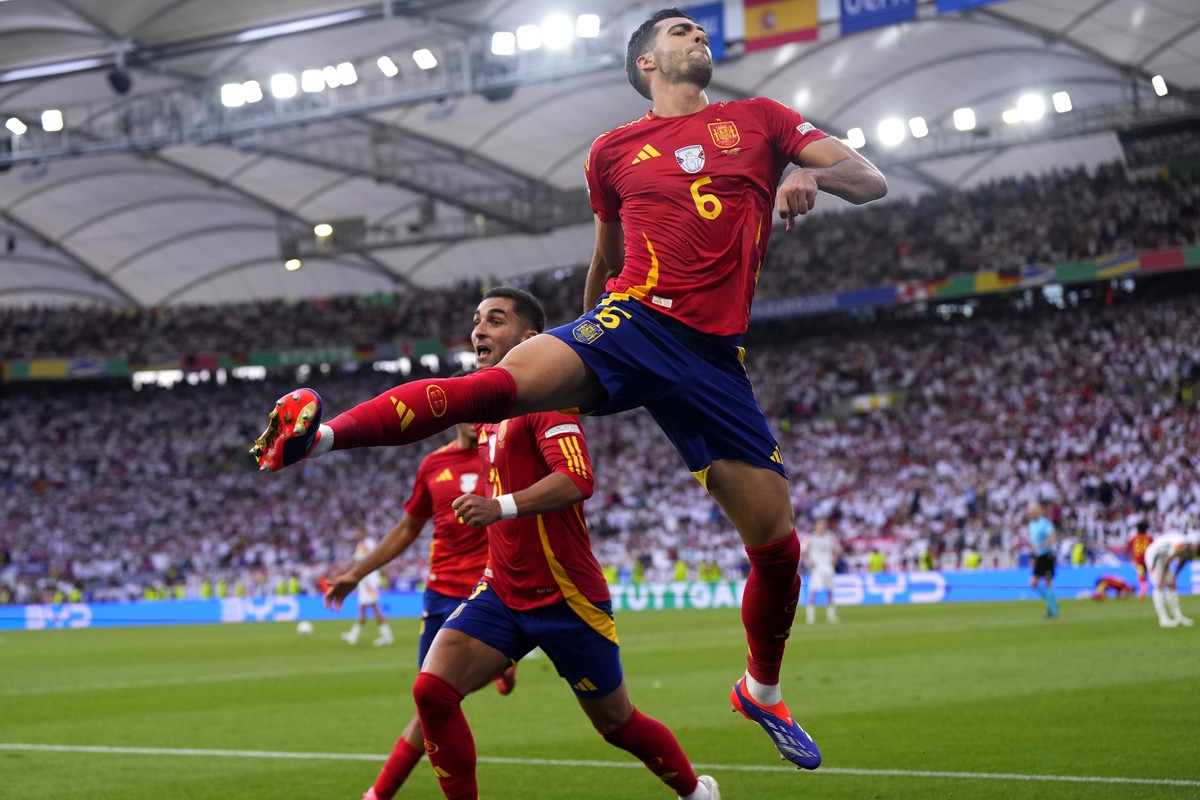 Spain's Mikel Merino celebrates after scoring his sides second goal during a quarter final match between Germany and Spain at the Euro 2024 soccer tournament in Stuttgart, Germany, Friday, July 5 ...