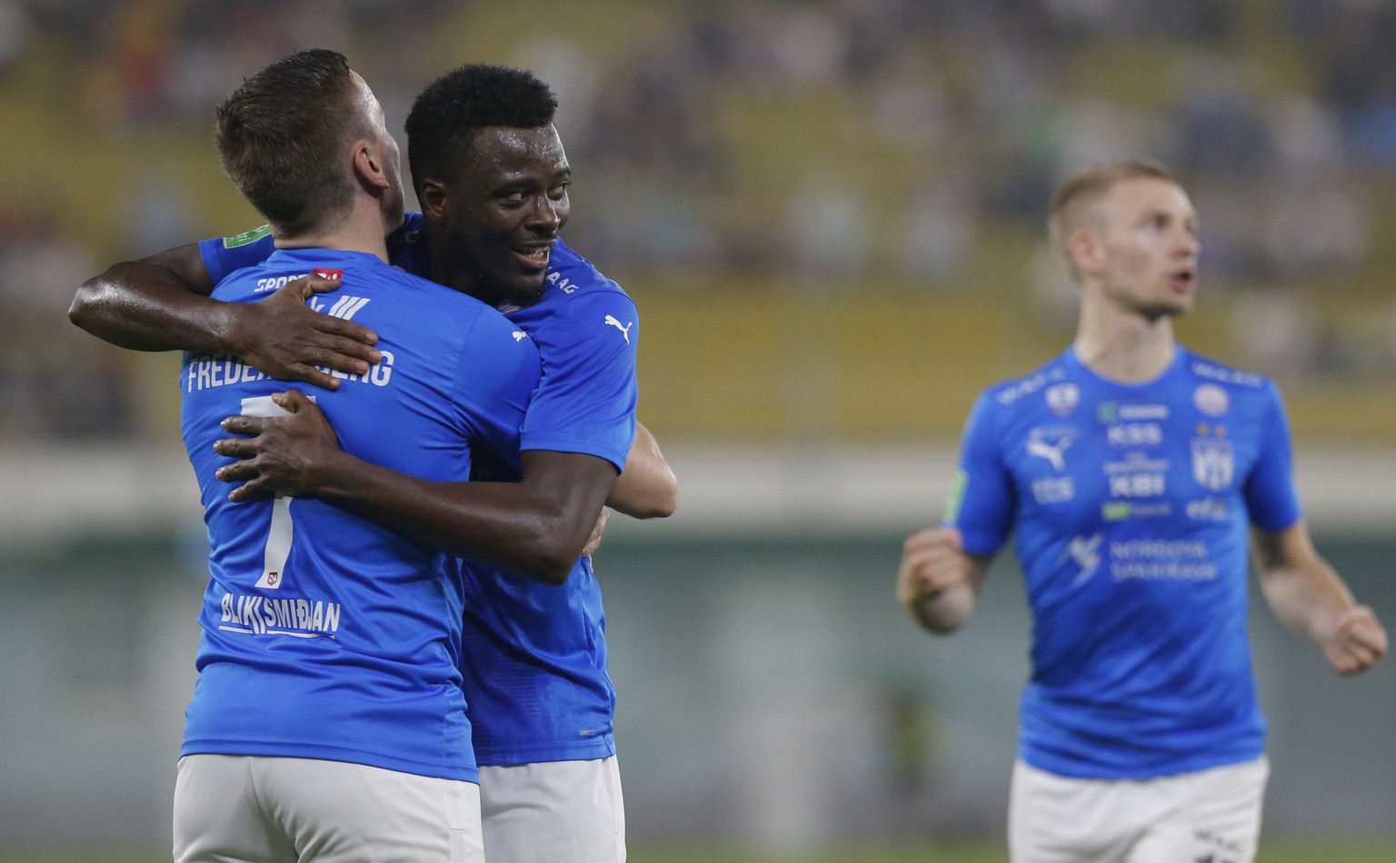 epa10831656 Luc Kassi (C) and Arni Frederiksberg (L) of Klaksvik react after scoring during the UEFA Europe League Play-offs 2nd leg match between Sheriff and Klaksvikon Sheriff Stadionin Tiraspol, Mo ...