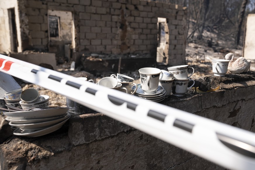 epa11129807 A look at several utensils from the burned house of Patricia Araya, known as 'La Pati', a staff in the Botanical Garden of Vina del Mar who died in a fire together with her mother...
