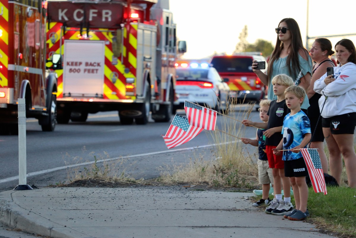 A procession from Kootenai Health headed to Spokane after a few firefighters were killed Sunday, June 29, 2025, when they were ambushed by sniper fire while responding to a blaze in a northern Idaho m ...