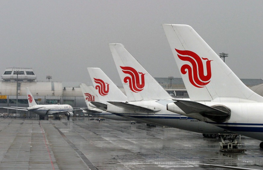 epa05926295 (FILE) - A view of Air China aircraft sitting on the tarmac at Capital Airport in Beijing, China, 06 July 2003 (reissued 25 April 2017). According to media reports on 25 April 2017, Air Ch ...