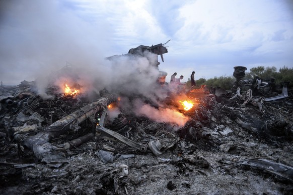 Trümmer des Malaysia-Airlines-Flugzeuges im Osten der Ukraine: Der Absturz in der Konfliktzone wird mit keinem Wort erwähnt.