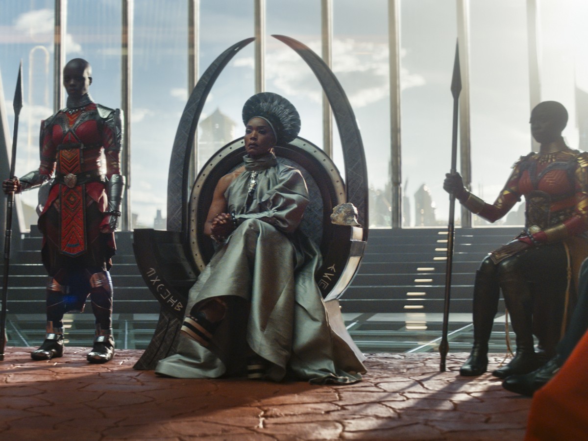 This image released by Marvel Studios shows, from left, Dorothy Steel as Merchant Tribe Elder, Florence Kasumba as Ayo, Angela Bassett as Ramonda, and Danai Gurira as Okoye in a scene from "Black ...