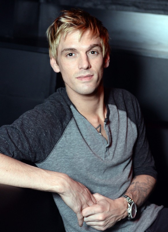 epa04574208 US pop singer Aaron Carter poses for pictures during an interview at K17 prior to a concert in Berlin, Germany, 21 January 2015. Carter starts a comeback tour in Germany on this month. EPA ...