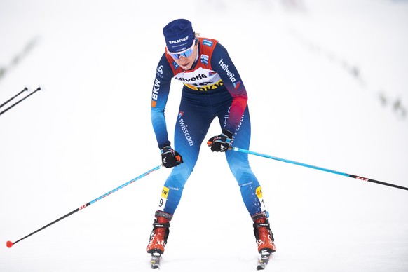 epa09073321 Nadine Faehndrich of Switzerland during the women's 30 km cross country skiing world cup race, in S-Chanf, Switzerland, 14 March 2021. EPA/GIAN EHRENZELLER