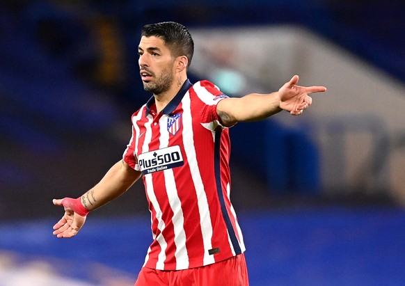 epa09080760 Luis Suarez of Atletico reacts during the UEFA Champions League round of 16, second leg soccer match between Chelsea FC and Atletico Madrid in London, Britain, 17 March 2021. EPA/NEIL HALL