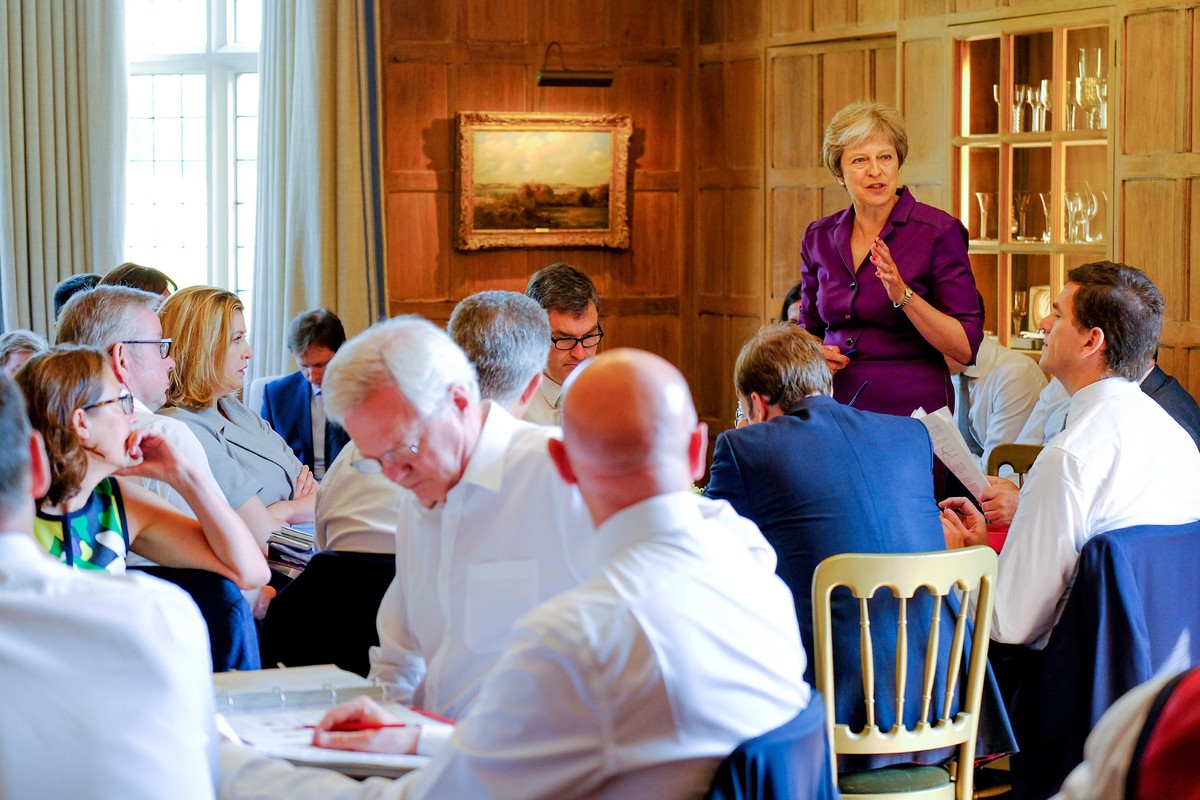 epa06869753 A handout photo made available by 10 Downing Street (MOD) showing British Prime Minister Theresa May commencing a meeting with her Cabinet to discuss Brexit at, the British Prime Minister& ...