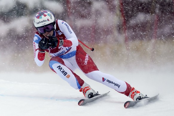 Michelle Gisin, of Switzerland, skis down the course during a women&#039;s World Cup downhill ski race in Lake Louise, Alberta, Friday, Dec. 6, 2019. Frank Gunn/The Canadian Press via AP)