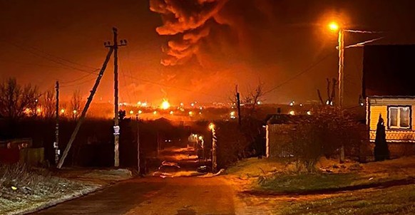 In this photo taken by an anonymous source, smoke and flame are from oil storage facilities hit by fire in Bryansk, Russia, Monday, April 25, 2022. The Emergencies Ministry said the massive fire at th ...