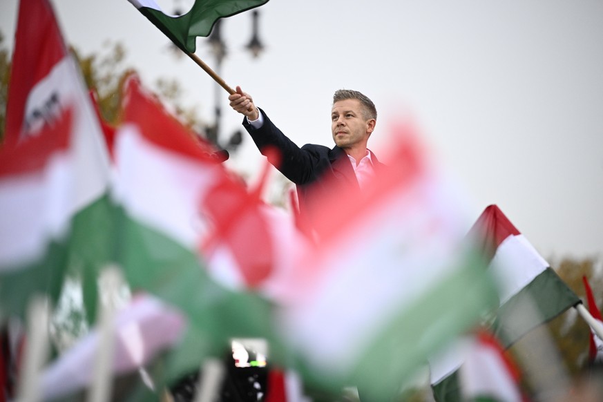 epaselect epa12476127 Leader of the Hungarian opposition Tisza Party Peter Magyar delivers his speech during a demonstration at the Heroes&#039; Square in Budapest, Hungary, 23 October 2025, on the 69 ...