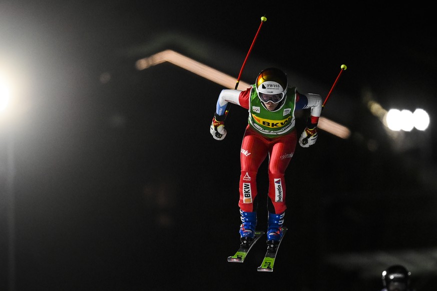 Talina Gantenbein of Switzerland speed down the track during the quarter finals at the Ski Cross World Cup Team race in Arosa, Switzerland, on Wednesday, December 15, 2021. (KEYSTONE/Gian Ehrenzeller)