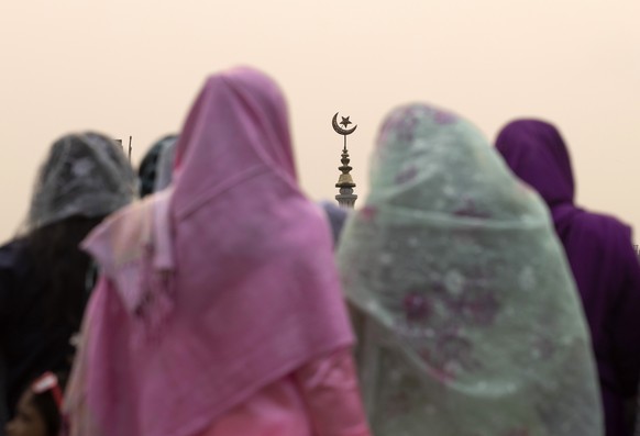 epaselect epa11271713 Women attend Eid al-Fitr prayers at Kashmiri Mashjid in Kathmandu, Nepal, 11 April 2024. Muslims worldwide celebrate Eid al-Fitr, a two or three-day festival at the end of the Mu ...