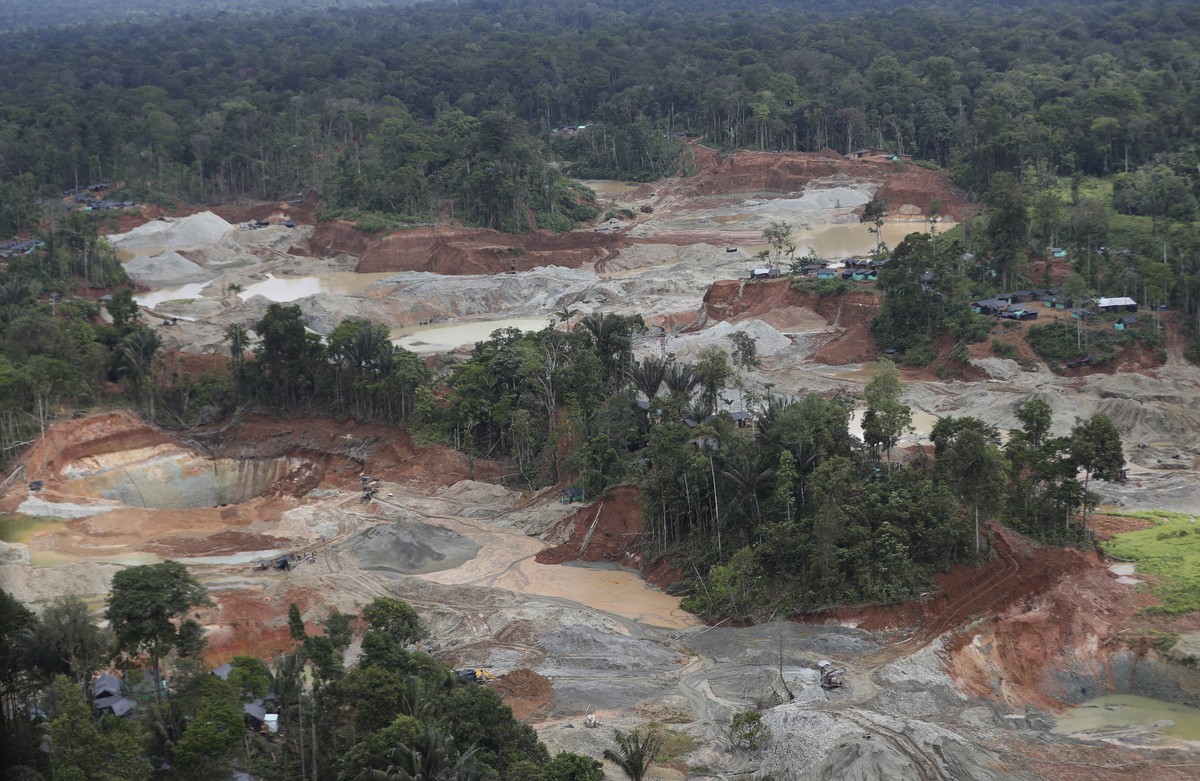 FILE - An illegal gold mining operation that contributed to deforestation is visible in Magui Payan, Colombia, April 20, 2021. The mine was among targets for destruction by National Police and soldier ...