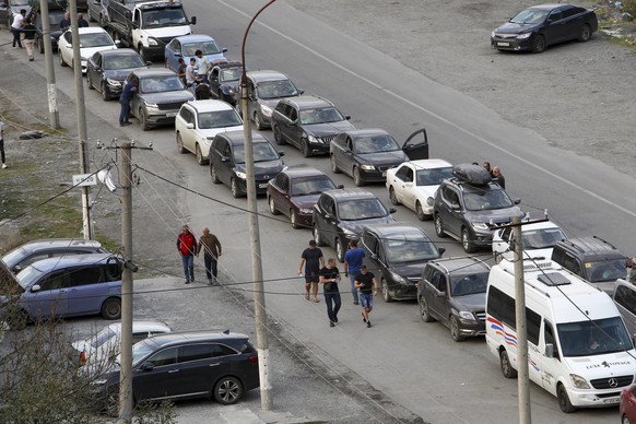 Cars queuing toward the border crossing at Verkhny Lars between Russia and Georgia, leaving Chmi, North Ossetia - Alania Republic, in Russia, Thursday, Sept. 29, 2022. Long lines of vehicles have form ...