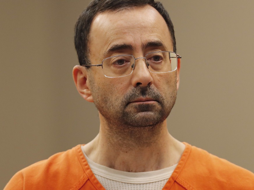 Dr. Larry Nassar, 54, appears in court for a plea hearing in Lansing, Mich., Wednesday, Nov. 22, 2017. Nasser, a sports doctor accused of molesting girls while working for USA Gymnastics and Michigan ...