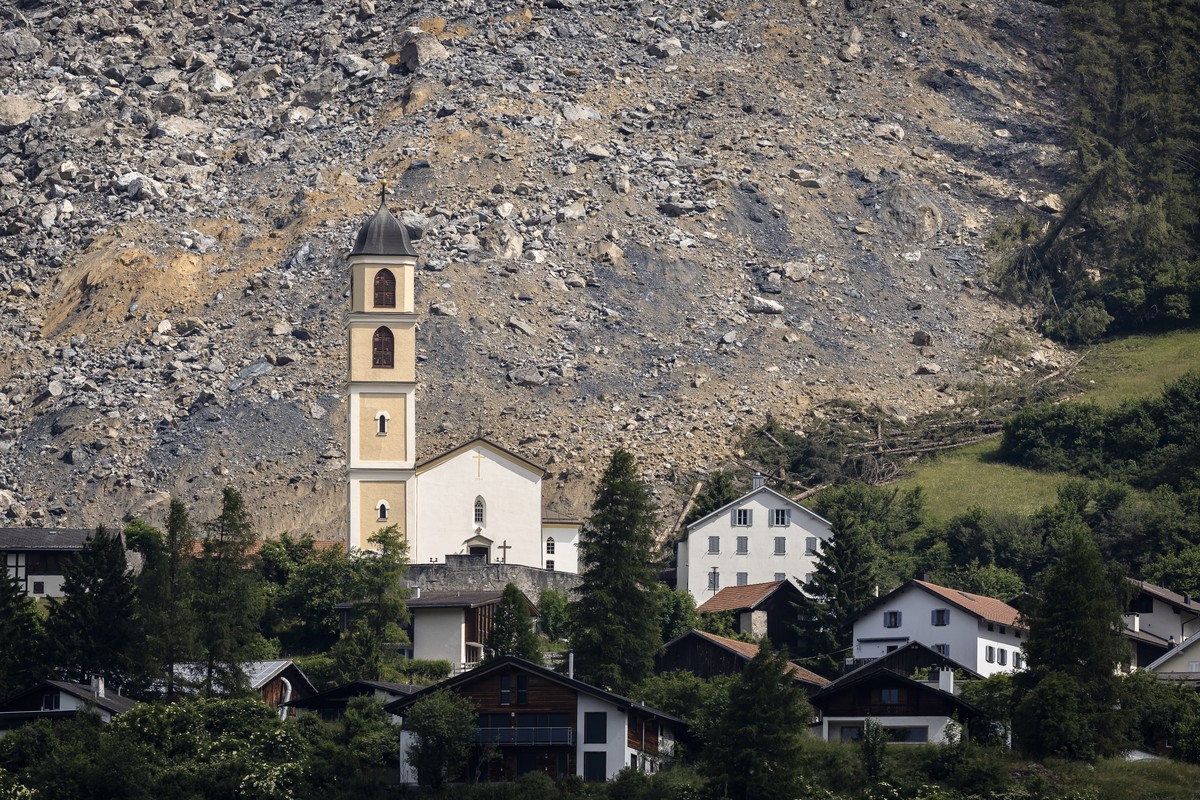 A general view shows the village Brienz-Brinzauls below the rockfall "Brienzer Rutsch" on Friday, June 16, 2023, in Brienz-Brinzauls, Graubuenden, Switzerland. On Friday night, a large part  ...