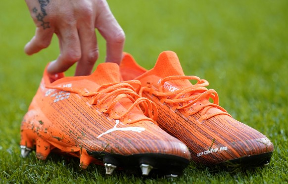 epa08788163 A close up view of the Puma Ultra 1.1 FG football boots of Manchester City&#039;s Kyle Walker ahead of the English Premier League soccer match between Sheffield United and Manchester City  ...