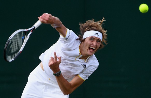 epa06065882 Alexander Zverev of Germany in action against Evgeny Donskoy of Russia during their first round match for the Wimbledon Championships at the All England Lawn Tennis Club, in London, Britai ...