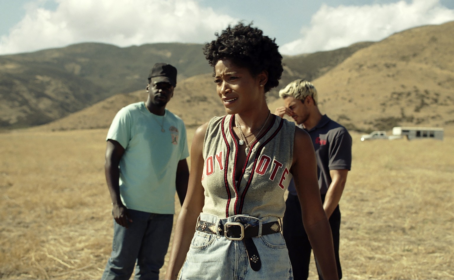 This image released by Universal Pictures shows, from left, Daniel Kaluuya, Keke Palmer, and Brandon Perea in a scene from &quot;Nope.&quot; (Universal Pictures via AP)