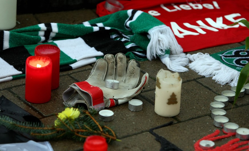 HANOVER, GERMANY - NOVEMBER 11: A goalkeeper glove is laid down in front of the AWD Arena on November 11, 2009 in Hanover, Germany. Enke, 32, goalkeeper for Hannover 96 and the German national team, w ...