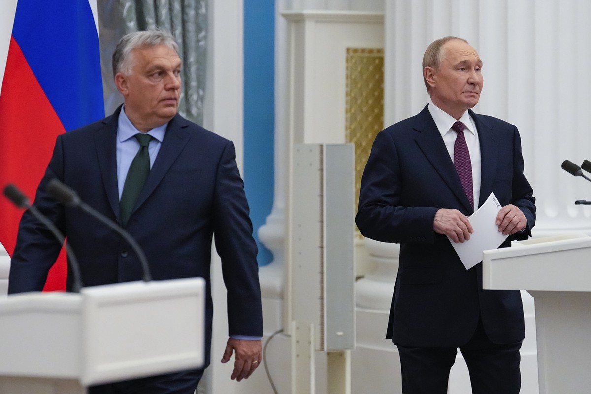 Russian President Vladimir Putin, right, and Hungarian Prime Minister Viktor Orban arrive to make press statements after their talks in the Kremlin in Moscow, Russia, Friday, July 5, 2024. Hungarian P ...
