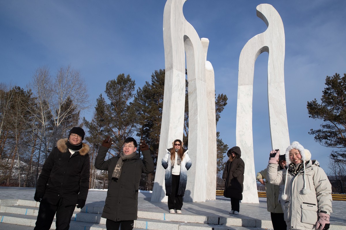 epa10399495 Tourists visit Beiji Village in Mohe, Heilongjiang Province, China, 10 January 2023 (issued 11 January 2023). Known as China's "North Pole," Mohe has an annual ice and snow  ...