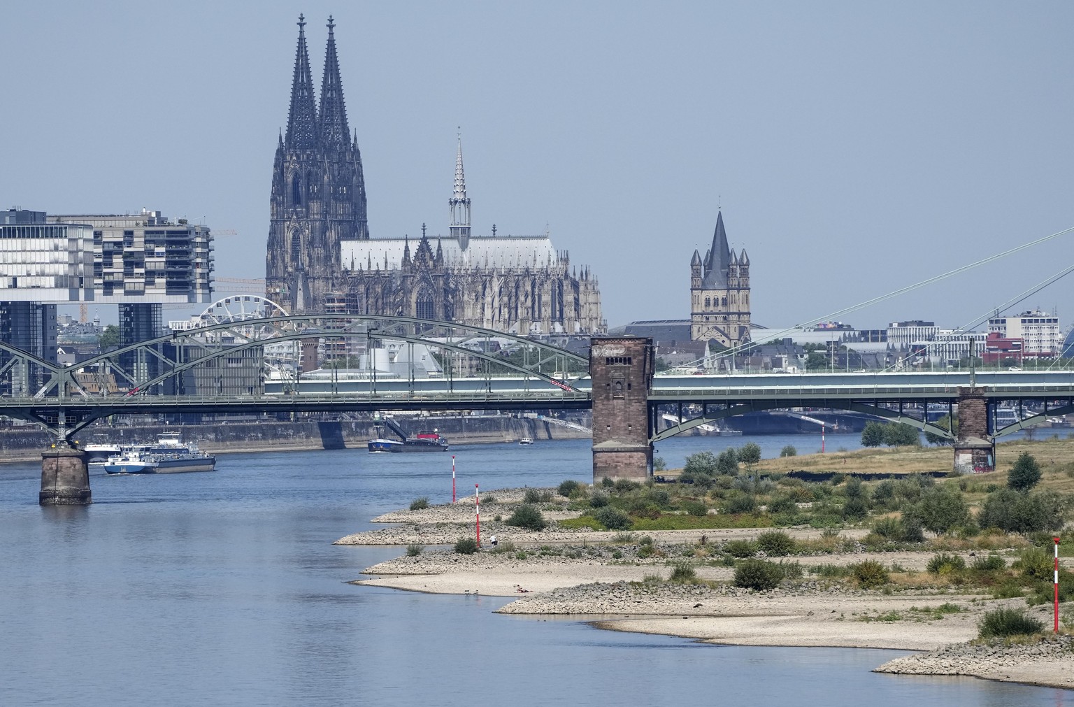 The river Rhine is pictured with low water in Cologne, Germany, Wednesday, Aug. 10, 2022. The low water levels are threatening Germany&#039;s industry as more and more ships are unable to traverse the ...
