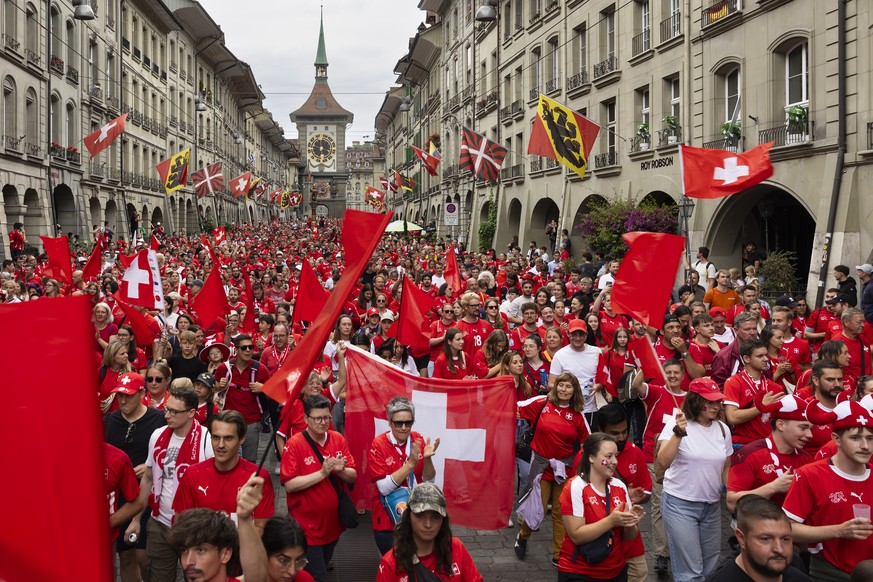 Swiss fans walk from old town in Bern towards the stadium during a fanwalk prior to the UEFA Women&#039;s EURO 2025 Group A soccer match between Switzerland and Iceland at the Wankdorf stadium in Bern ...