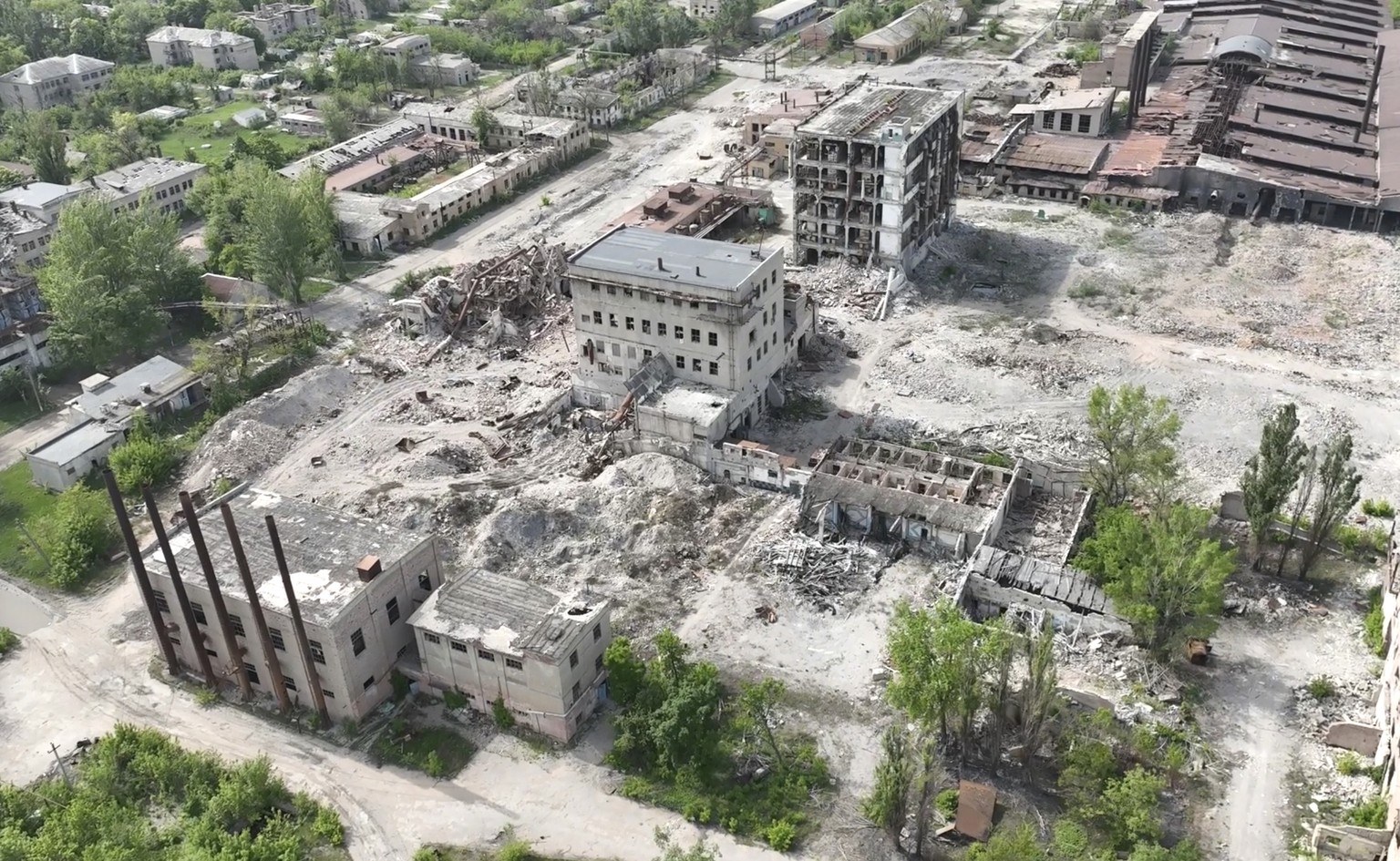 This photo taken from a drone video provided by Ukraine Patrol Police, shows devastation in Chasiv Yar, an eastern Ukrainian city Russia is assaulting, Ukraine, Monday, April 29, 2024. The footage sho ...