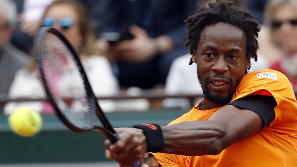 epa06008084 Gael Monfils of France in action against Richard Gasquet of France during their men’s singles 3rnd round match during the French Open tennis tournament at Roland Garros in Paris, France, 0 ...