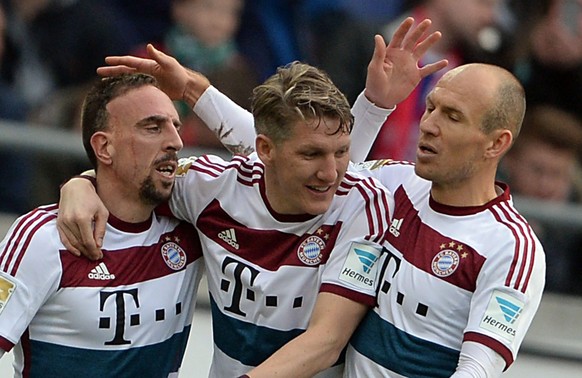 epa04652277 Munich's Franck Ribery (L-R), Bastian Schweinsteiger and Arjen Robben celebrate the 1-3 goal during the German Bundesliga soccer match between Hannover 96 and FC Bayern Munich at HDI Arena in Hanover, Germany, 07 March 2015. 

(EMBARGO CONDITIONS - ATTENTION - Due to the accreditation guidelines, the DFL only permits the publication and utilisation of up to 15 pictures per match on the internet and in online media during the match)  EPA/carmen jaspersen  EPA/PETER STEFFEN