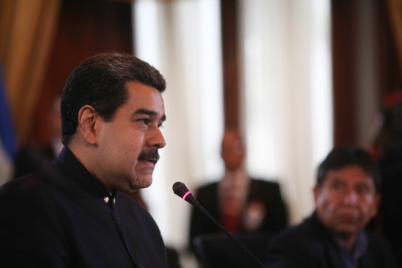 epa06434498 A handout picture provided by Miraflores press, shows Venezuelan President Nicolás Maduro who speaks on the political council of the Bolivarian Alliance for the Peoples of America (ALBA) i ...