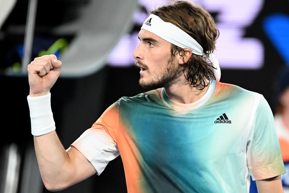 epa09713888 Stefanos Tsitsipas of Greece reacts during his men&#039;s semi final match against Daniil Medvedev of Russia at the Australian Open Grand Slam tennis tournament at Melbourne Park in Melbou ...