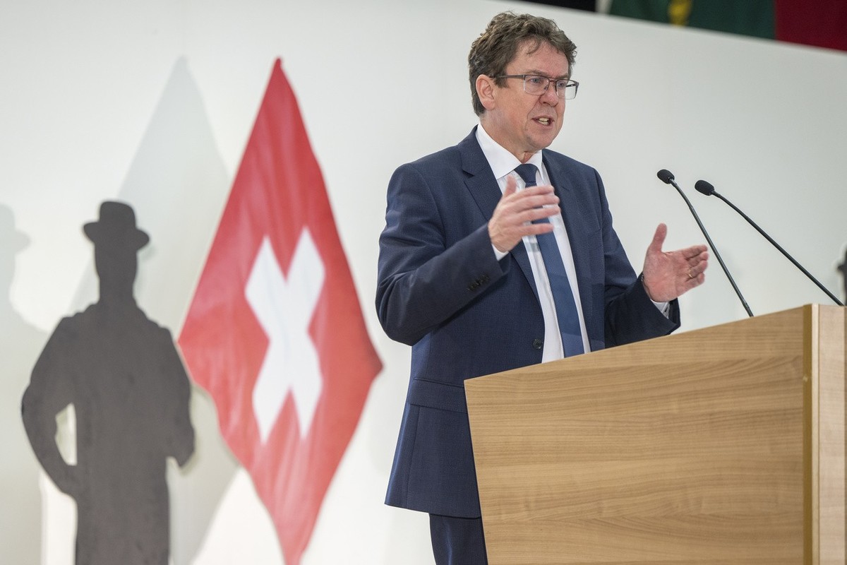 Albert Roesti, Membre du Conseil federal, s'exprime, lors de l'assemblee des delegues du parti de l'Union Democratique du Centre, UDC SVP, ce samedi 18 mars 2023 a Meyrin pres de Geneve ...