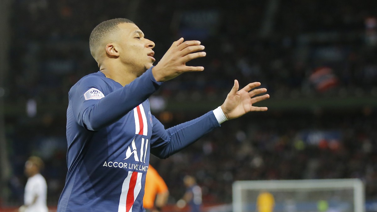 PSG's Kylian Mbappe reacts after missing a scoring chance during the French League One soccer match between Paris-Saint-Germain and Dijon, at the Parc des Princes stadium in Paris, France, Saturd ...