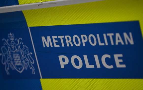 epa10428435 The logo of a metropolitan police force is displayed on a vehicle in London, Britain, January 25, 2023. Chief Police Commissioner Sir Mark Rowley spoke to the London Assembly's Police and Crime C...