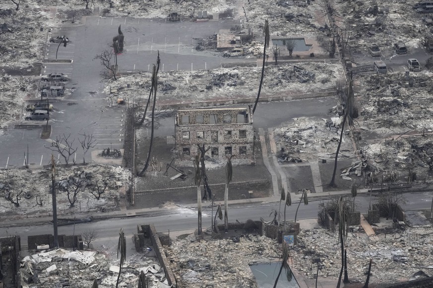Wildfire wreckage is seen Thursday, Aug. 10, 2023, in Lahaina, Hawaii. The search of the wildfire wreckage on the Hawaiian island of Maui on Thursday revealed a wasteland of burned out homes and oblit ...