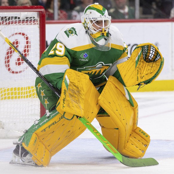 Minnesota Wild goaltender Marc-Andre Fleury focuses on the play during the second period of an NHL hockey game against the Winnipeg Jets, Sunday, Dec. 31, 2023, in St. Paul, Minn. (AP Photo/Bailey Hil ...