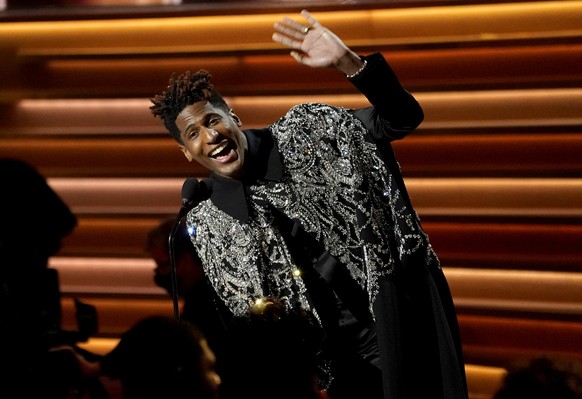 Jon Batiste accepts the award for album of the year for &quot;We Are&quot; at the 64th Annual Grammy Awards on Sunday, April 3, 2022, in Las Vegas. (AP Photo/Chris Pizzello)
Jon Batiste