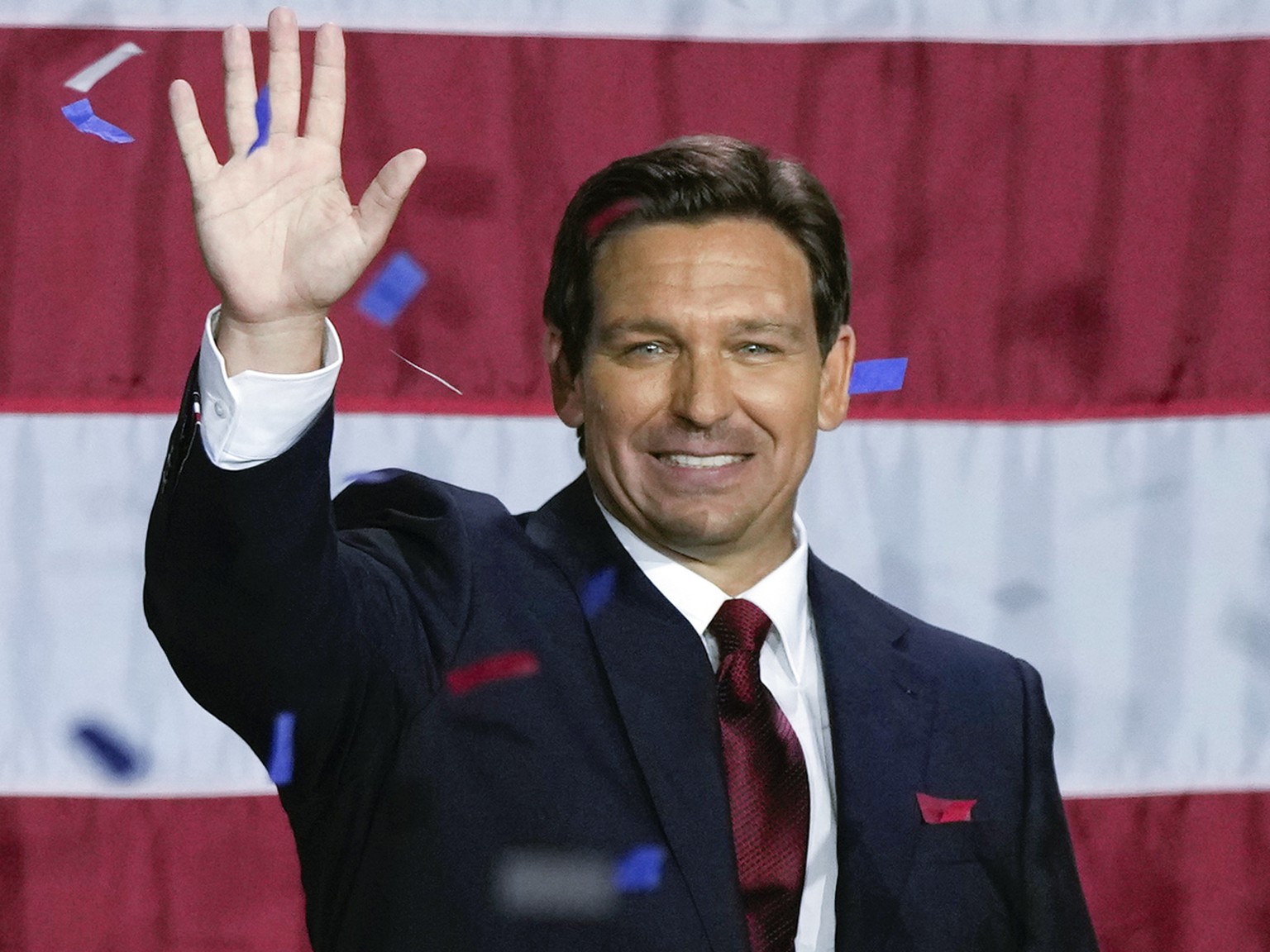 Incumbent Florida Republican Gov. Ron DeSantis, right, waves alongside his Lt. Gov. Jeanette Nunez at an election night party after winning his race for reelection, in Tampa, Fla, Tuesday, Nov. 8, 202 ...