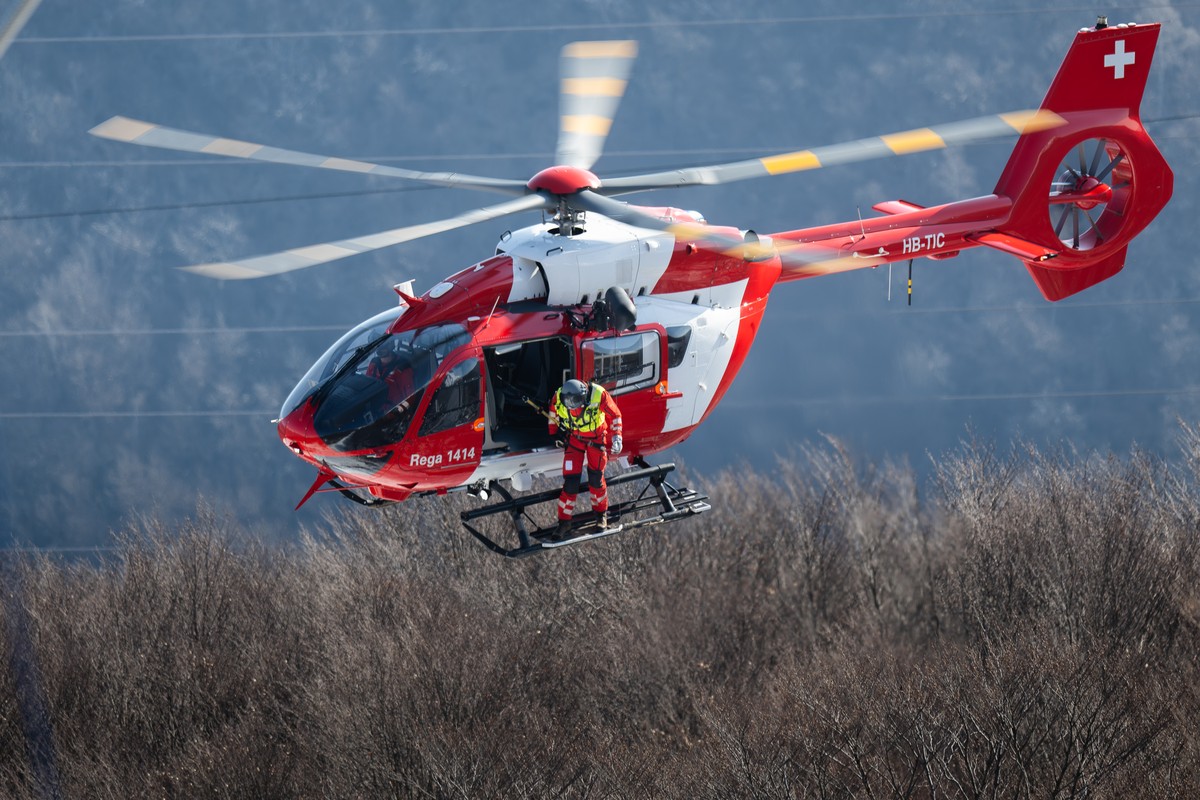 The new Airbus H 145 D3 based at the REGA base in Magadino in flight, during the REGA exercise involving the evacuation of the Monte Tamaro cable car, Rivera, Wednesday 18 March 2026..(KEYSTONE/Ti-Pre ...