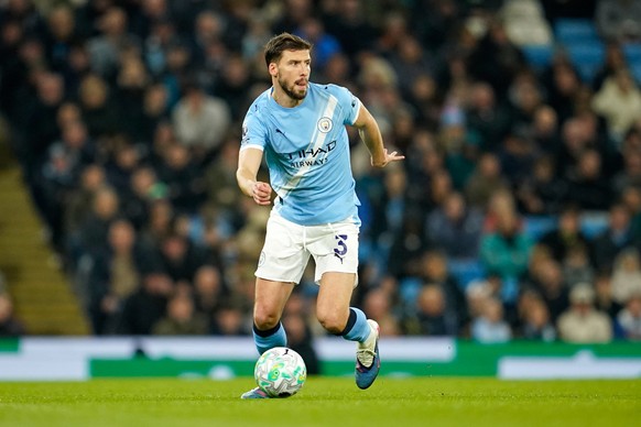 Manchester City's Ruben Dias runs with the ball during the English Premier League soccer match between Manchester City and Nottingham Forest in Manchester, England, Wednesday, March 4, 2026. (AP  ...